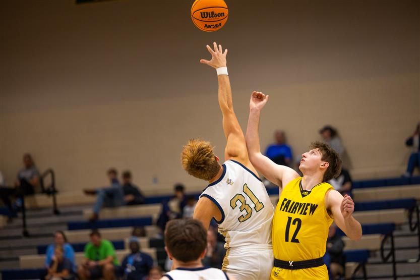 Students play basketball